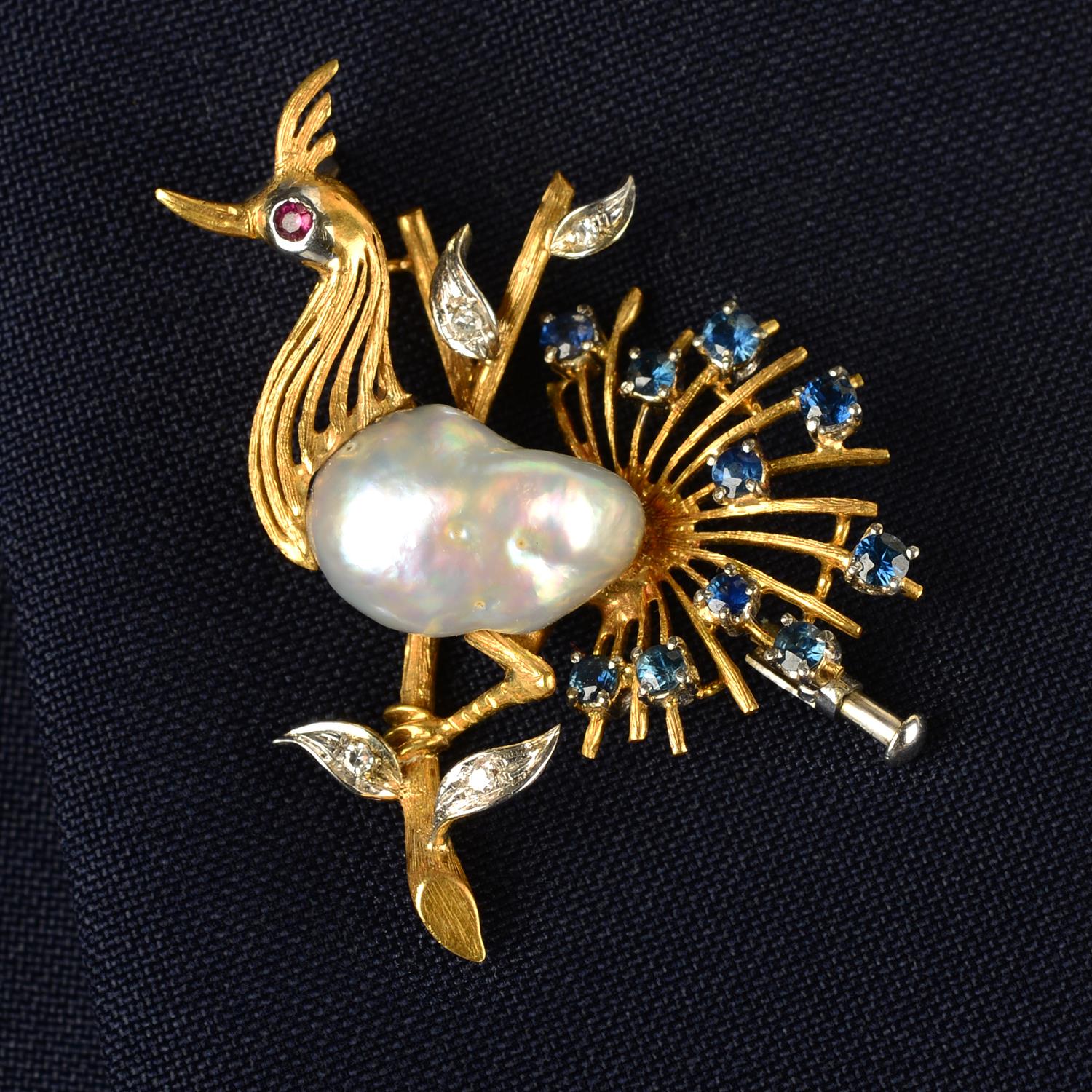 A mid 20th century 18ct gold baroque cultured pearl, sapphire and diamond bird brooch,