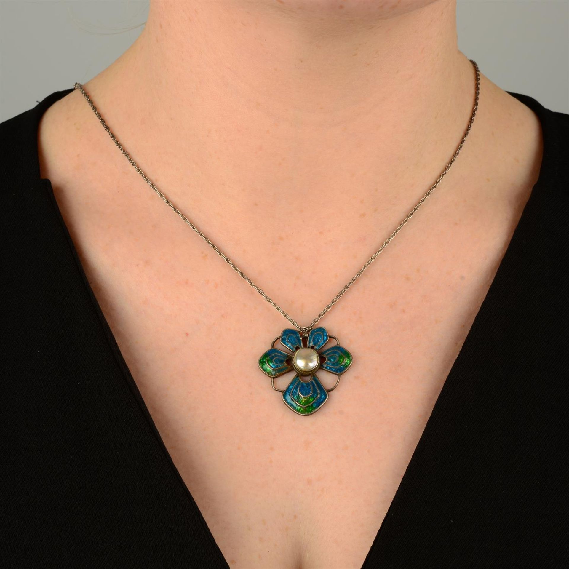 An Arts and Crafts silver blister pearl and enamel floral pendant, by Liberty & Co. - Image 5 of 5