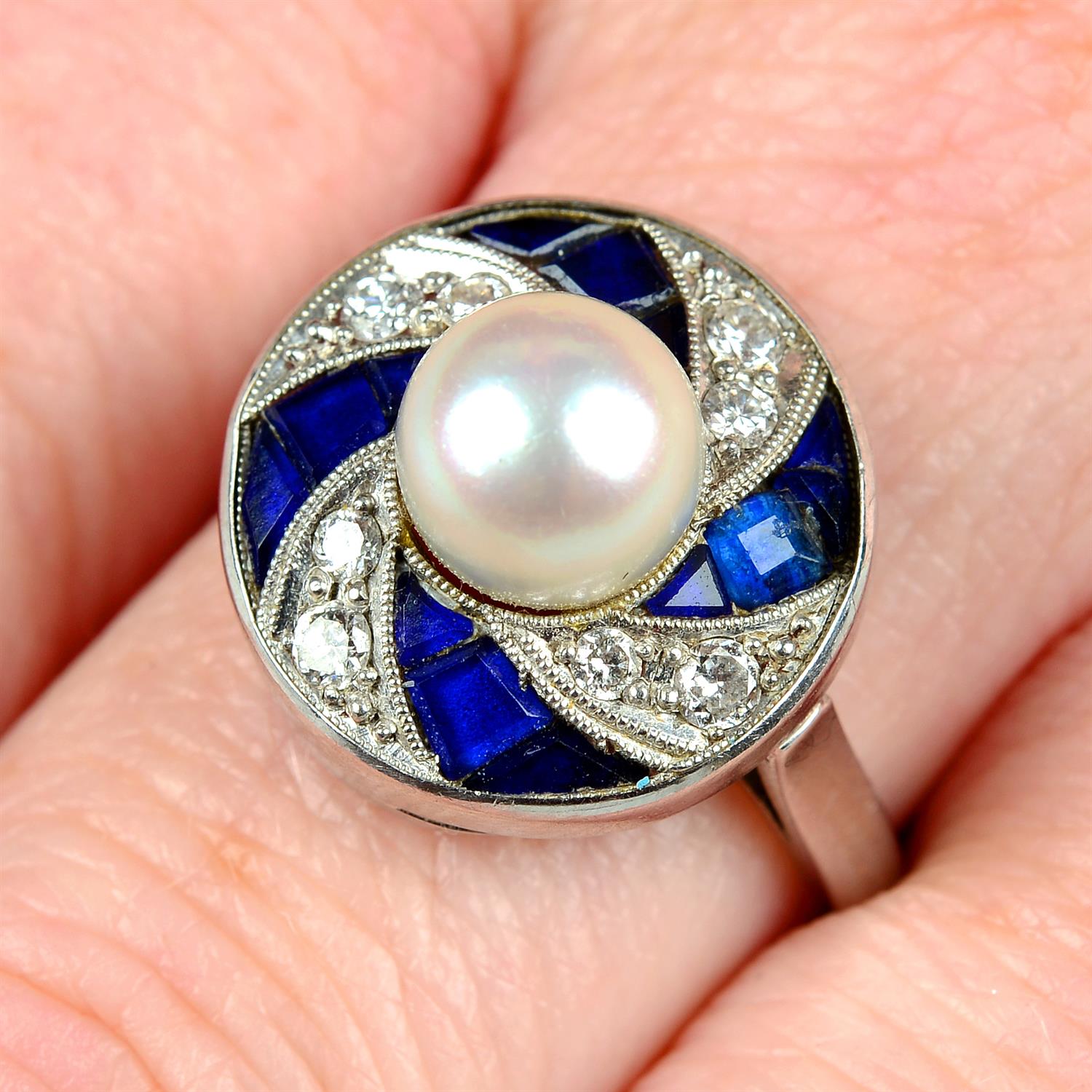 An 18ct gold cultured pearl, brilliant-cut diamond and blue paste geometric dress ring.