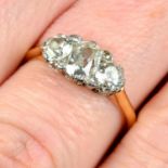 An early 20th century 18ct gold old-cut oval shape diamond three-stone ring, with rose-cut diamond