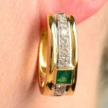 A pair of emerald and brilliant-cut diamond hoop earrings.