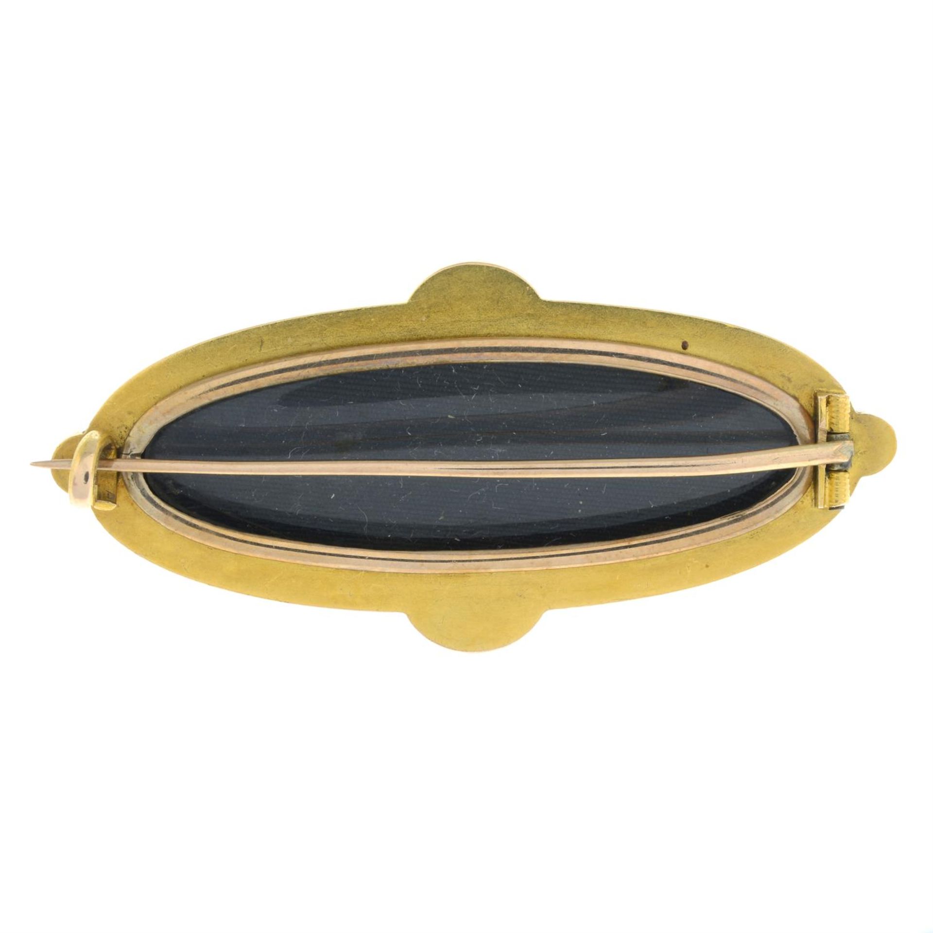 A late 19th century gold onyx and vari-cut diamond mourning brooch, with black enamel and split - Image 3 of 5