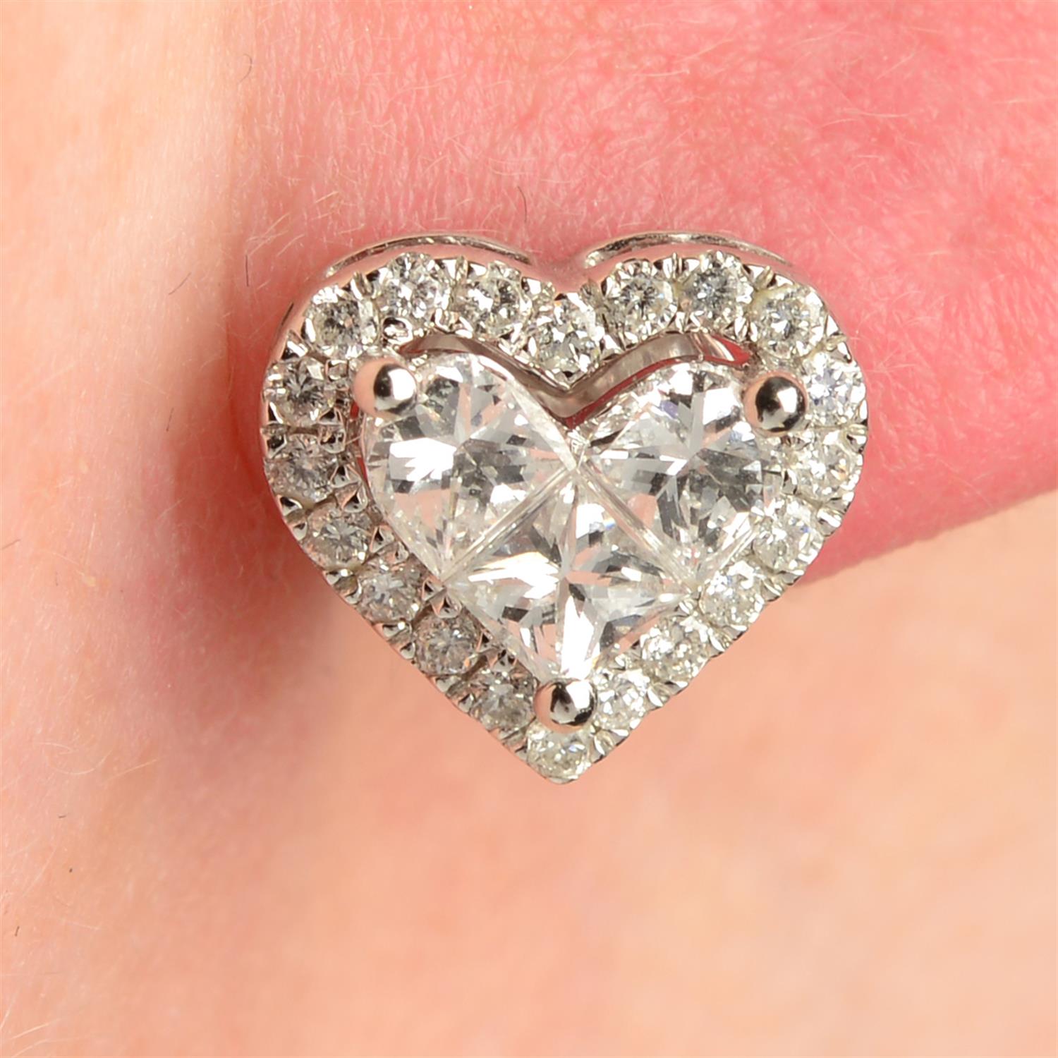 A pair of 18ct gold vari-cut diamond heart-shape cluster earrings.