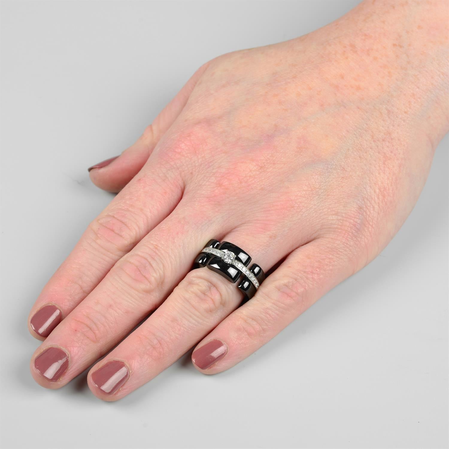 An 18ct gold brilliant-cut diamond and black ceramic 'Ultra' ring, by Chanel. - Image 6 of 6