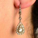 A pair of rose-cut diamond earrings.