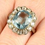 An aquamarine and old-cut diamond cluster ring.