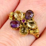 A late 19th to early century gold citrine, amethyst and ruby pansy ring.