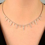 A brilliant-cut diamond line necklace, with brilliant-cut diamond drop fringe.