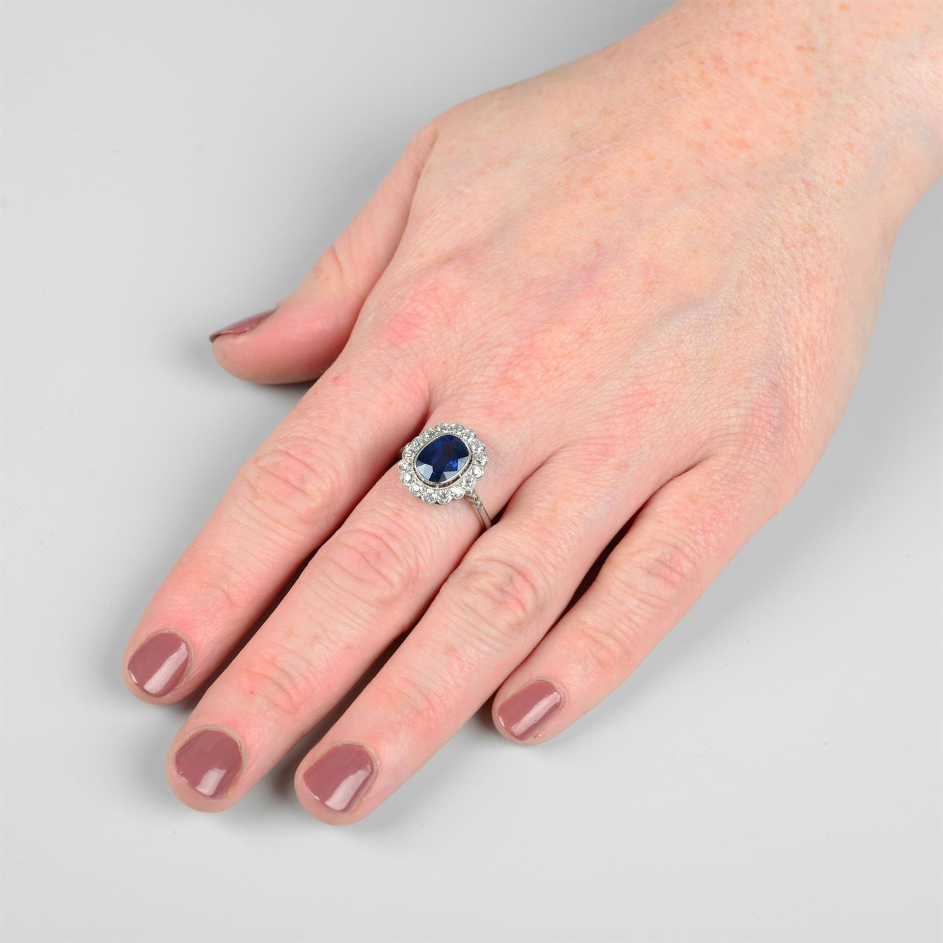 A sapphire and old-cut diamond cluster ring. - Image 5 of 5