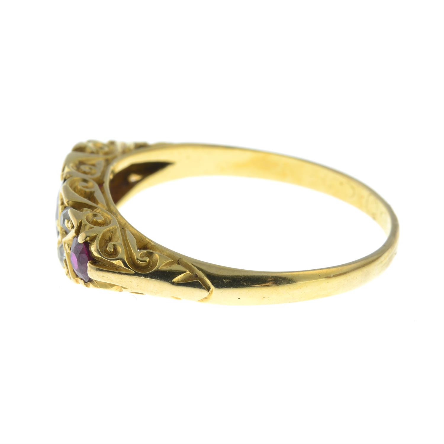 An early 20th century 18ct gold graduated ruby three-stone ring, with diamond spacers. - Image 3 of 5