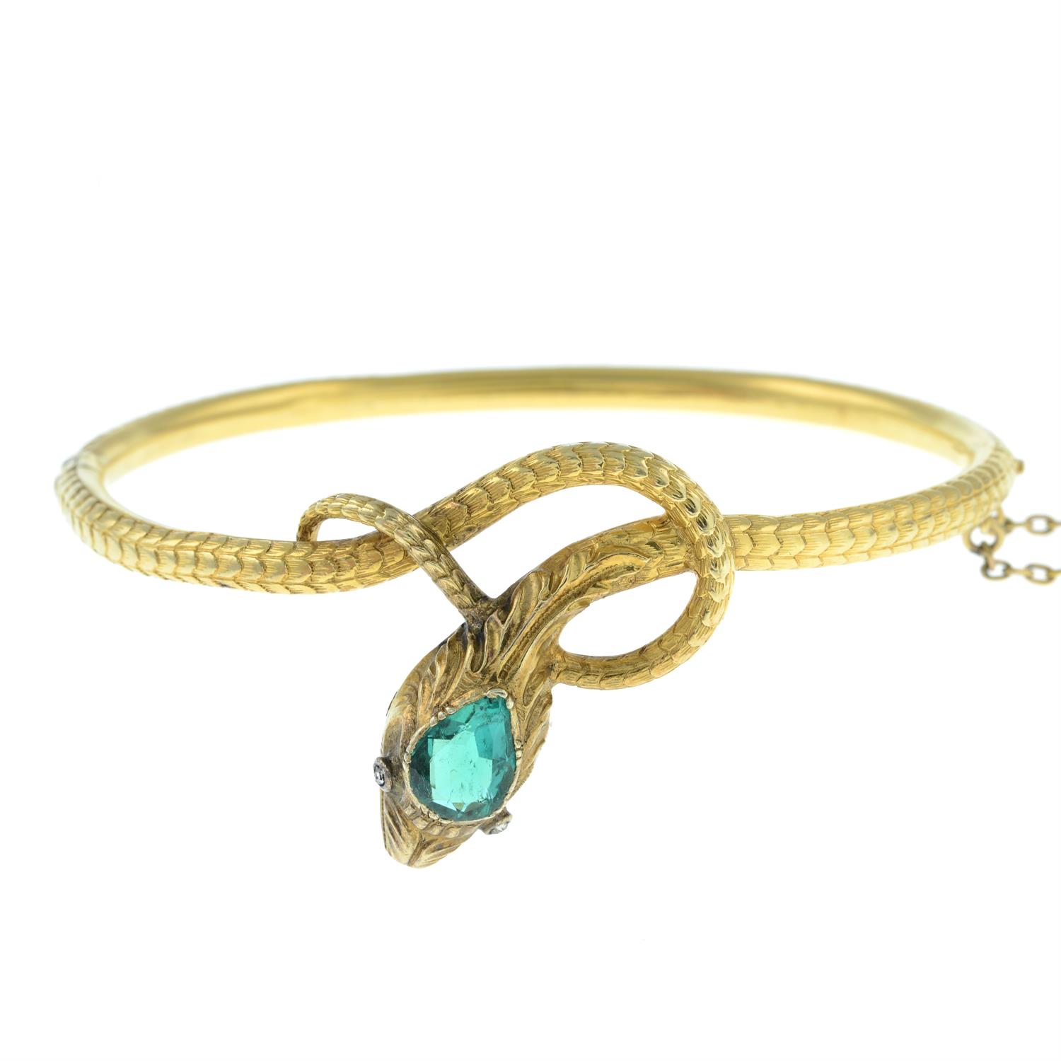 An early 19th century 18ct gold engraved snake bangle, with Colombian emerald crest and diamond - Image 2 of 4