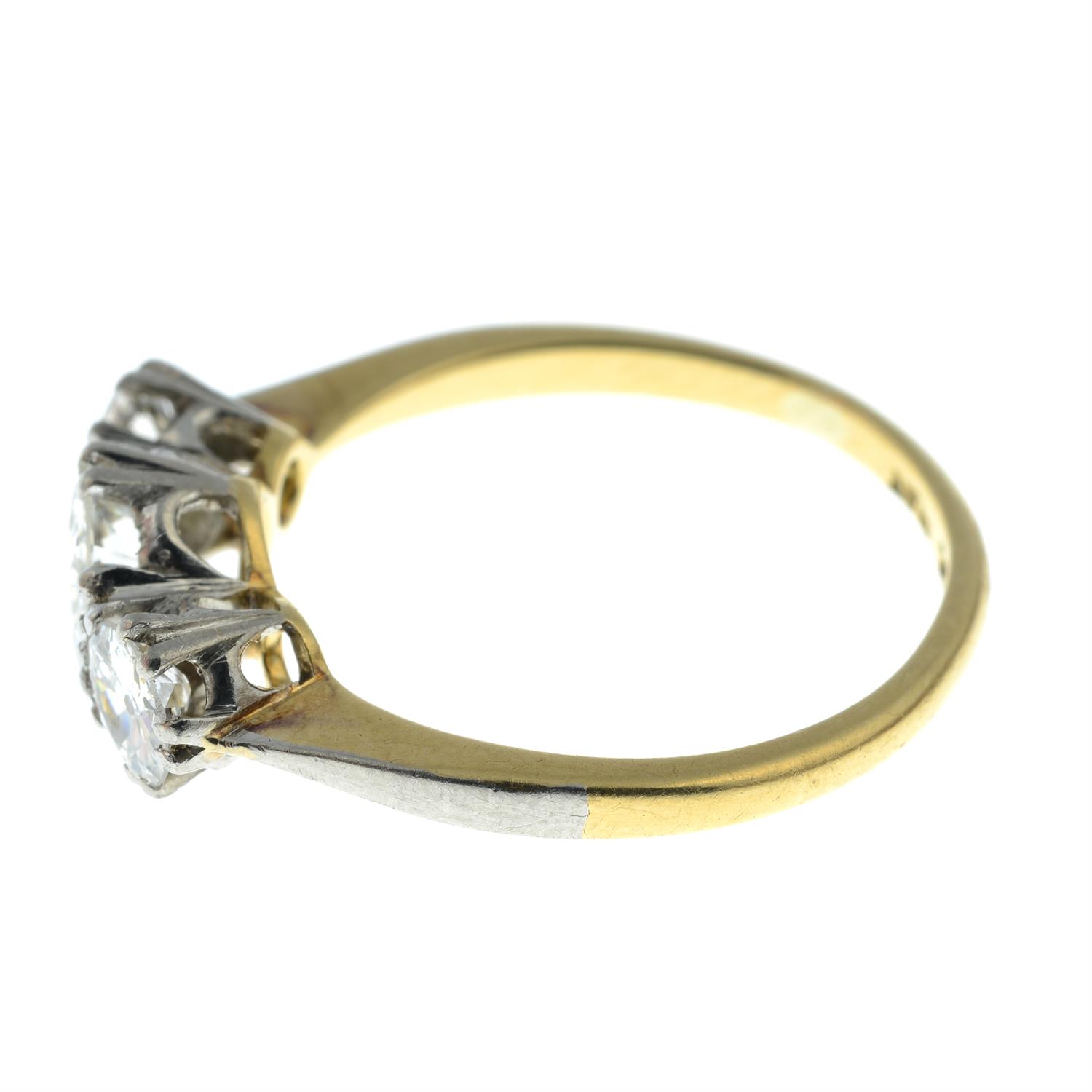 A mid 20th century 18ct gold graduated circular-cut diamond three-stone ring. - Image 4 of 5