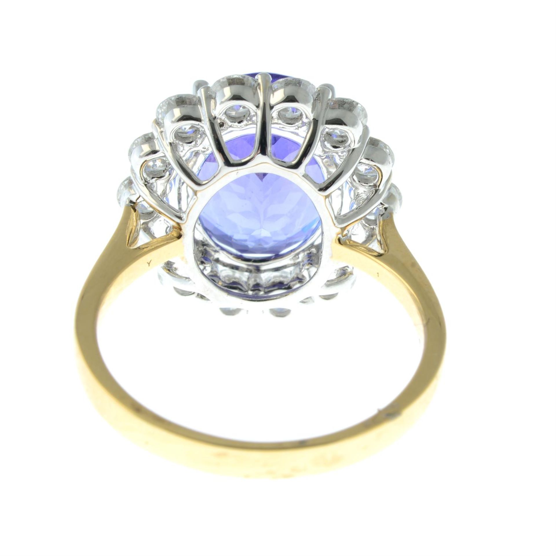 An 18ct gold tanzanite and brilliant-cut diamond cluster ring. - Image 4 of 5