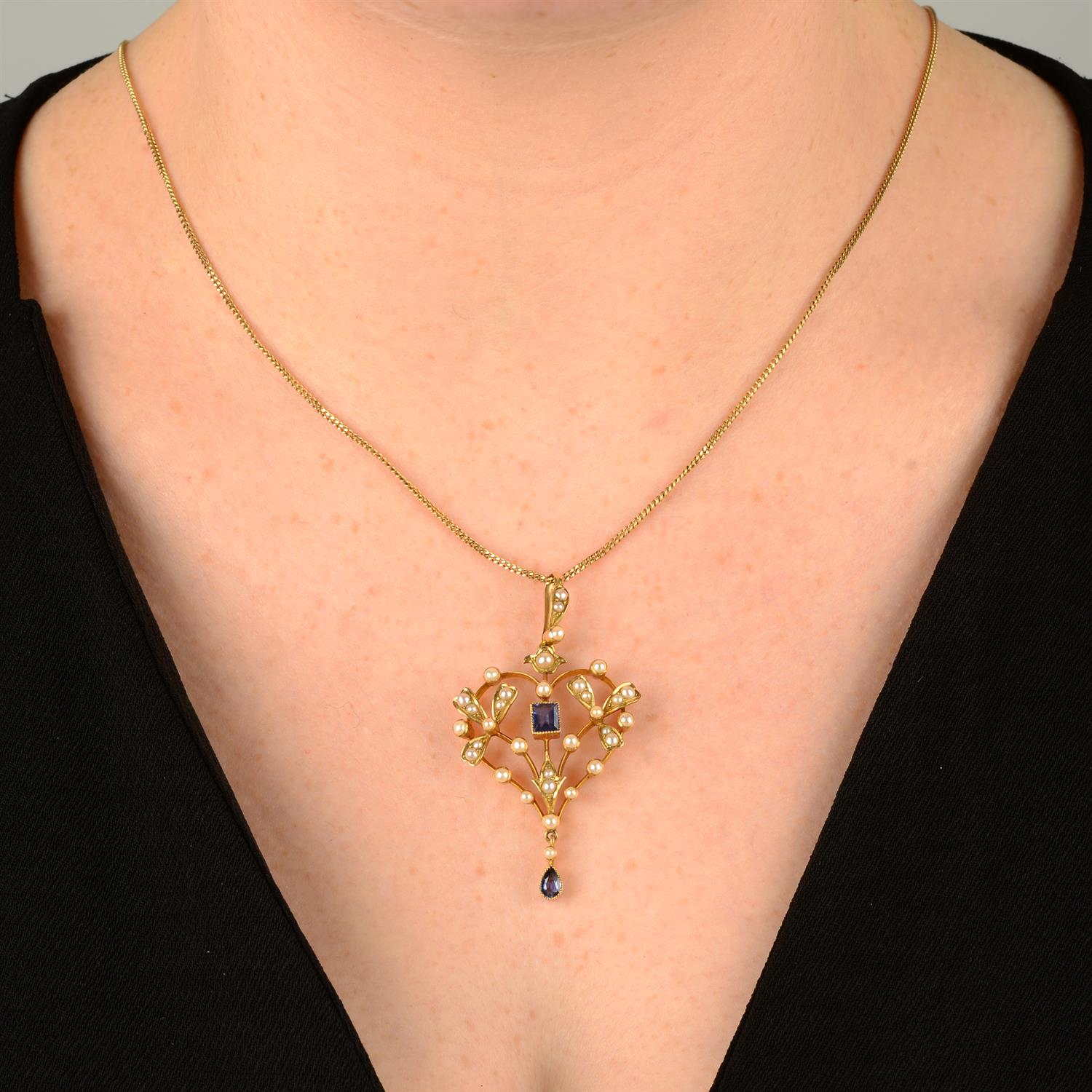 An early 20th century 15ct gold sapphire and split pearl pendant, with later 9ct gold chain. - Image 5 of 5