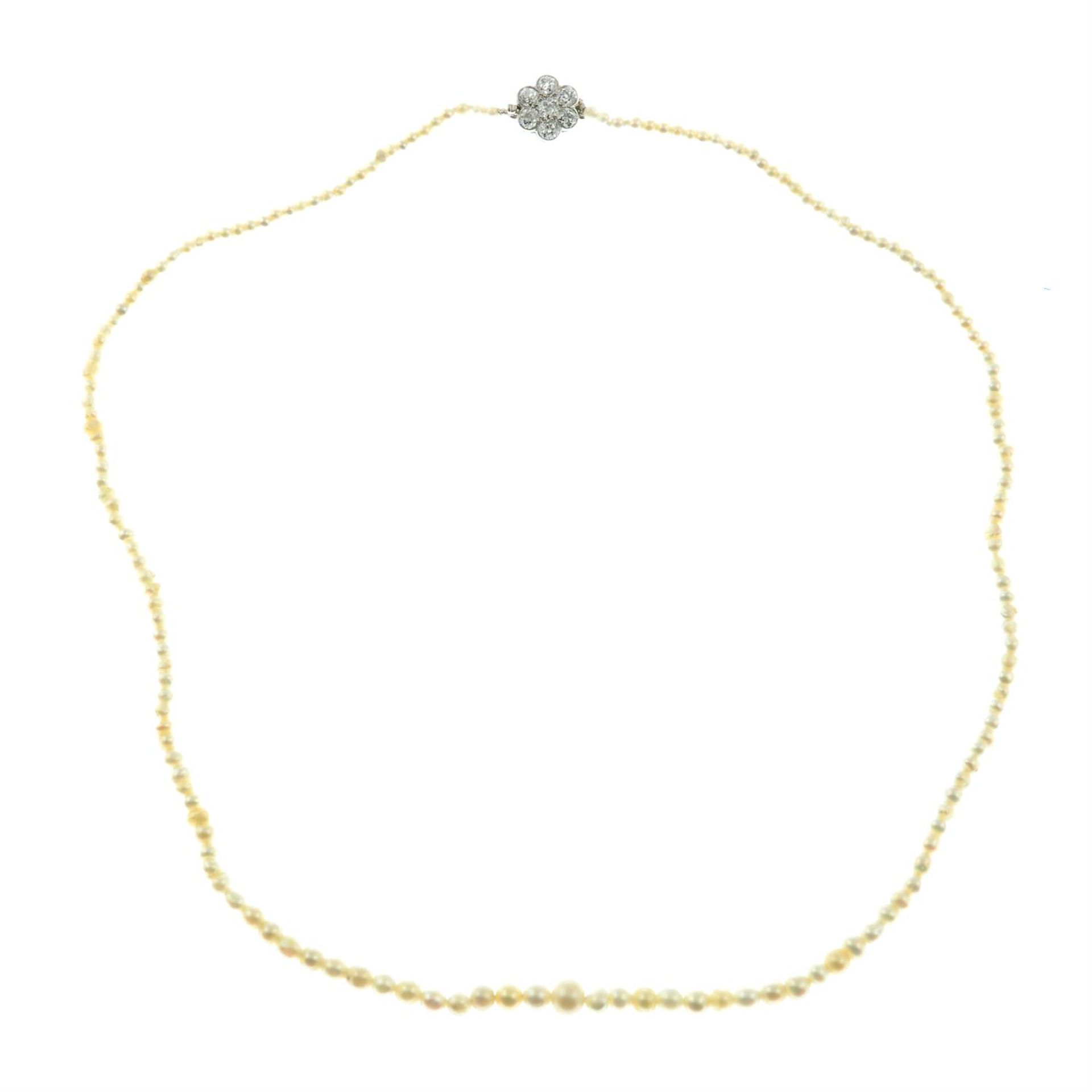 A natural pearl necklace, with old-cut diamond cluster clasp. - Image 2 of 5