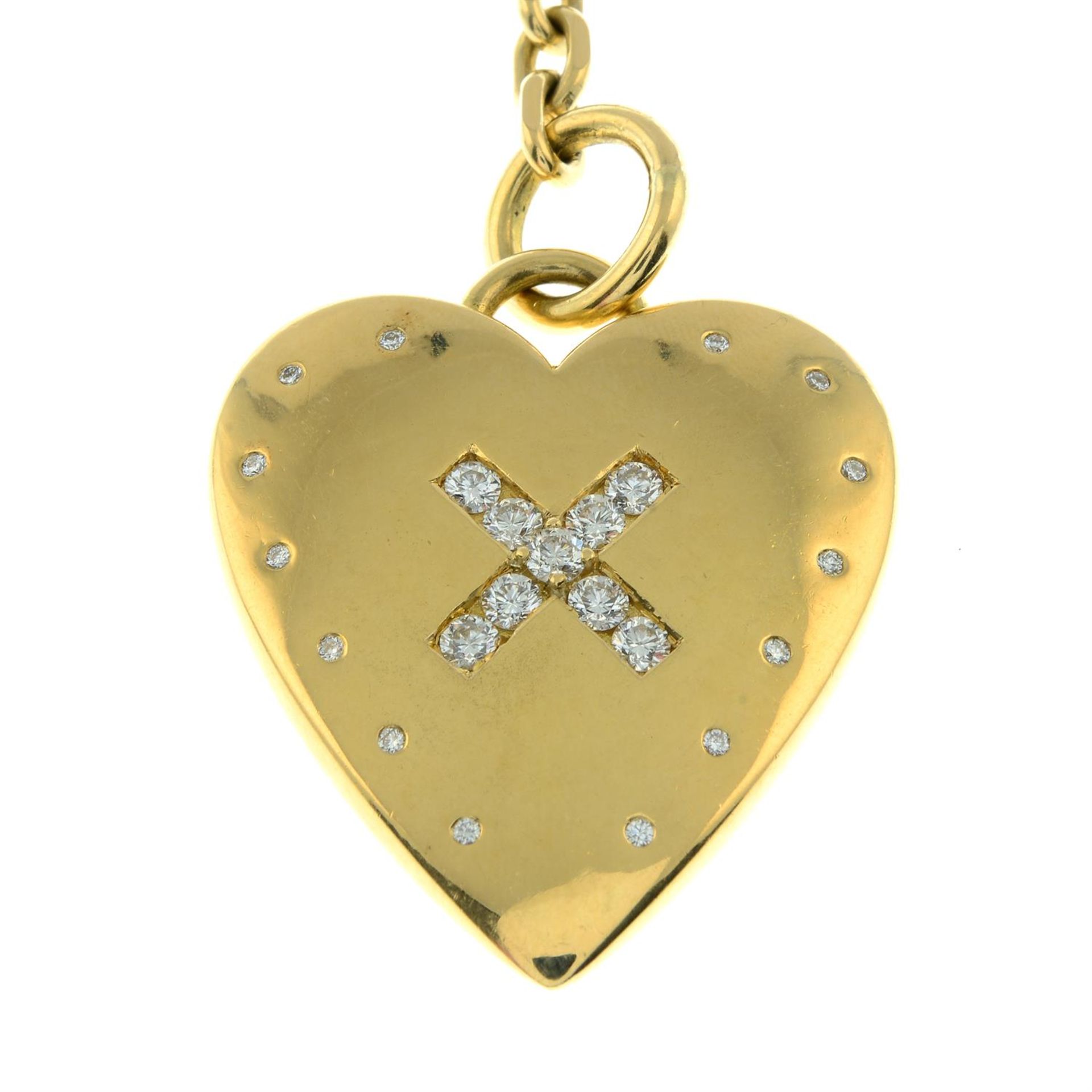 An 18ct gold crossed brilliant-cut diamond heart pendant, on chain. - Image 2 of 4