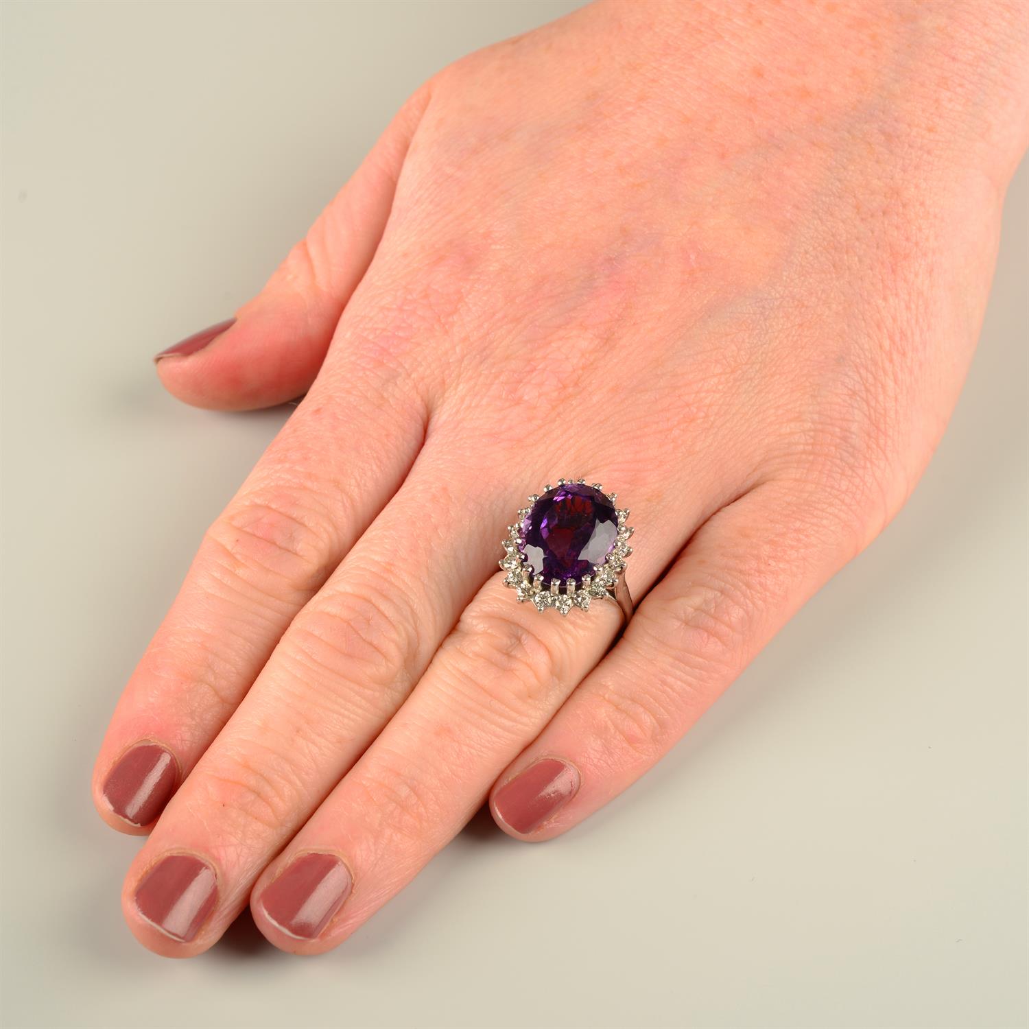 An 18ct gold amethyst and brilliant-cut diamond cluster ring. - Image 5 of 5