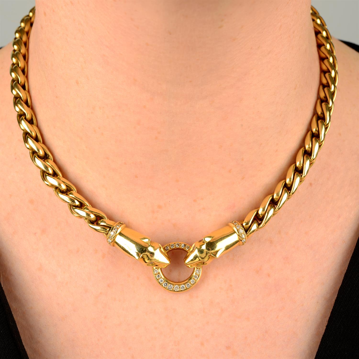 A brilliant-cut diamond, panther head necklace.