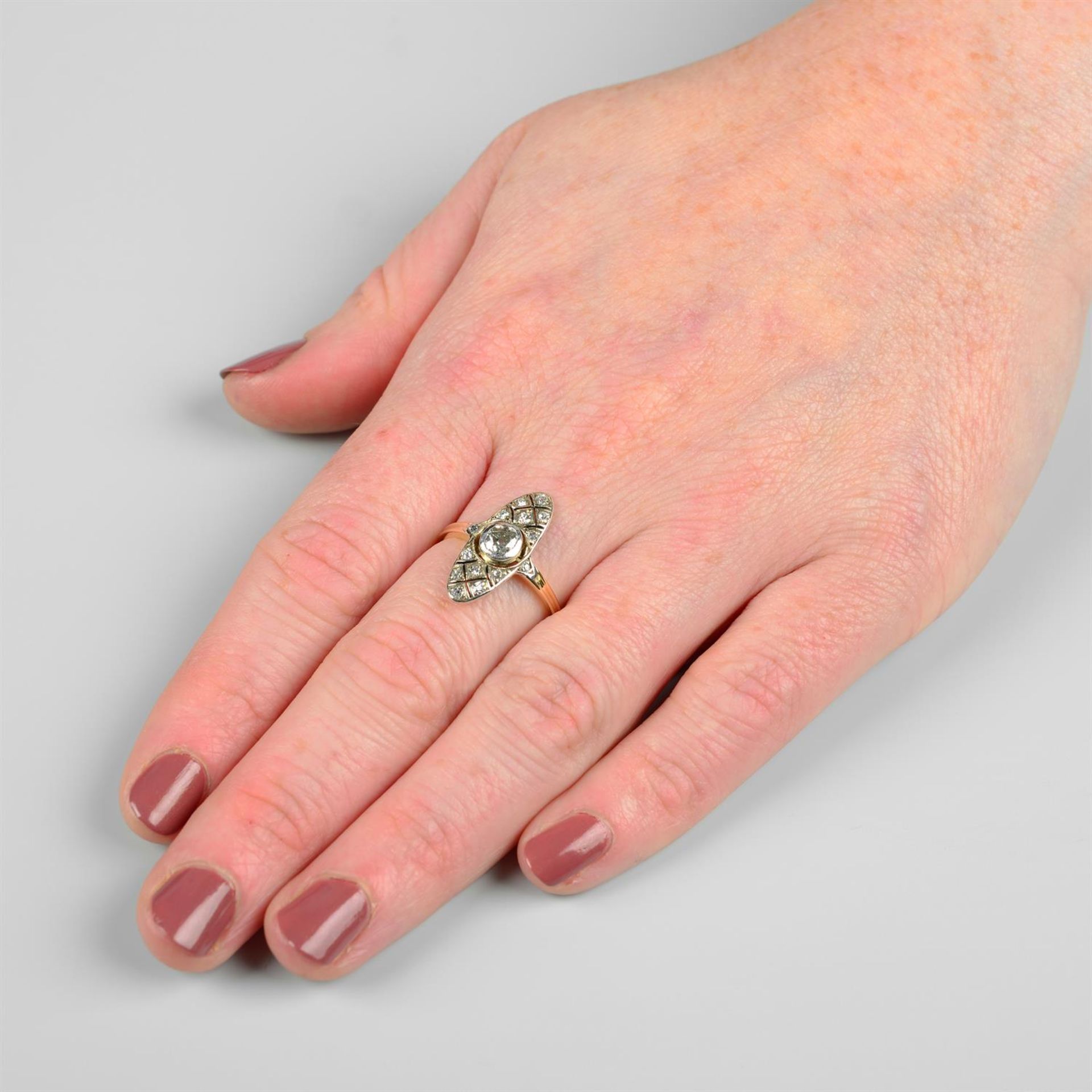 An early 20th century silver and 15ct gold, vari-cut diamond pierced lattice dress ring. - Image 5 of 5