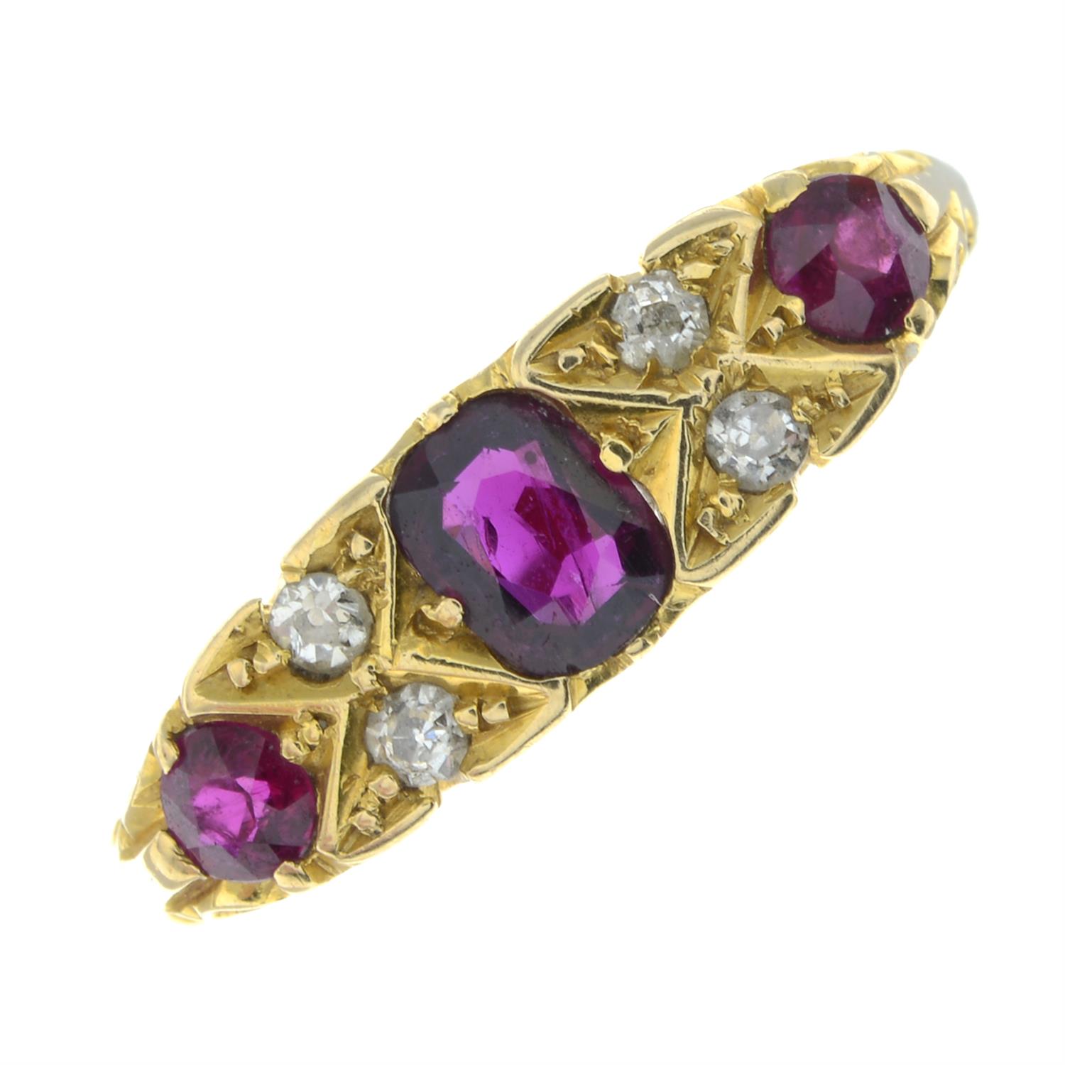 An early 20th century 18ct gold graduated ruby three-stone ring, with diamond spacers. - Image 2 of 5