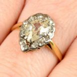 A mid 20th century 18ct gold old pear-cut diamond and single-cut diamond cluster ring.