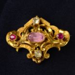 A mid 19th century gold pink topaz, ruby and chrysoberyl scrolling foliate brooch,