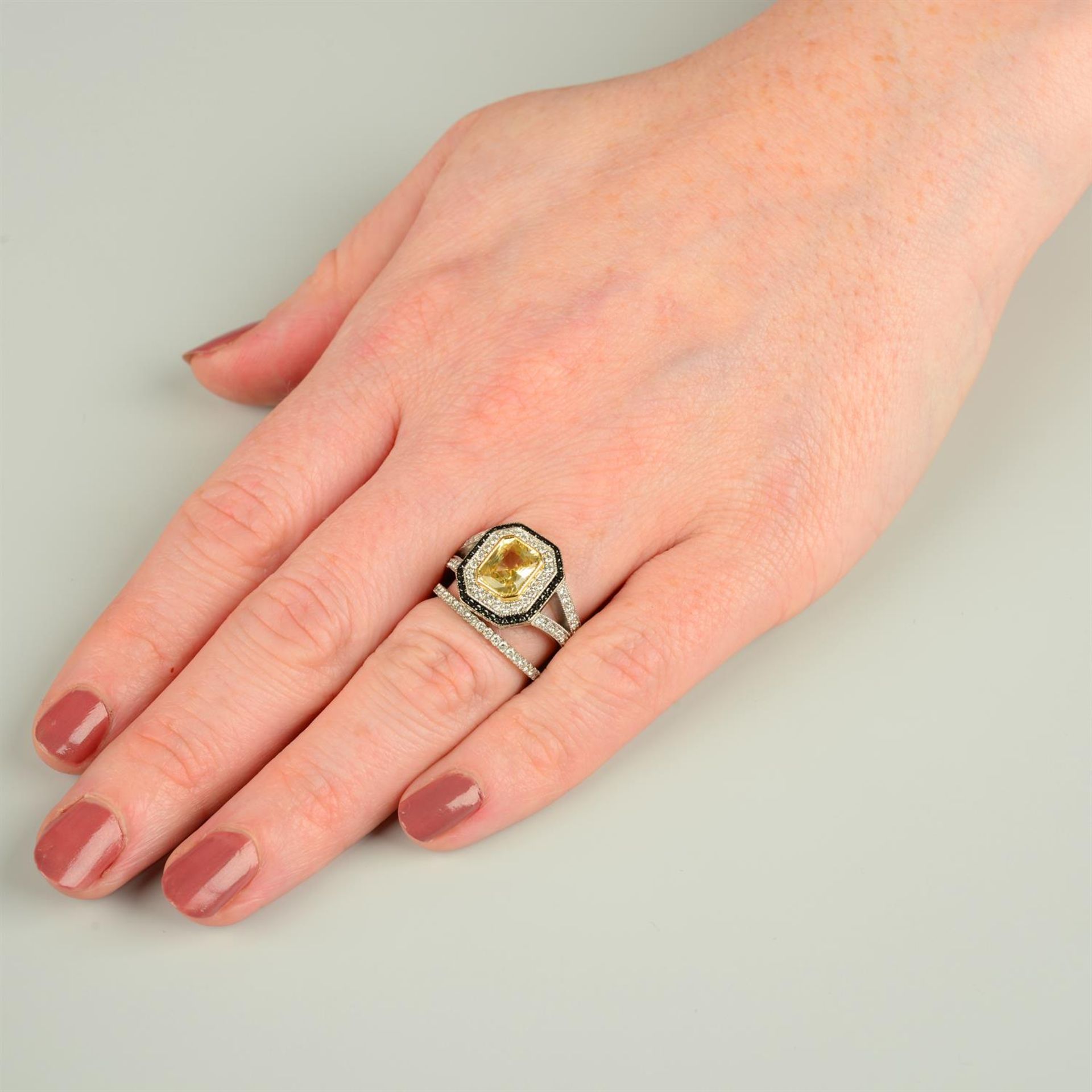 An 18ct gold yellow sapphire, brilliant-cut diamond and black diamond cluster ring, - Image 5 of 5