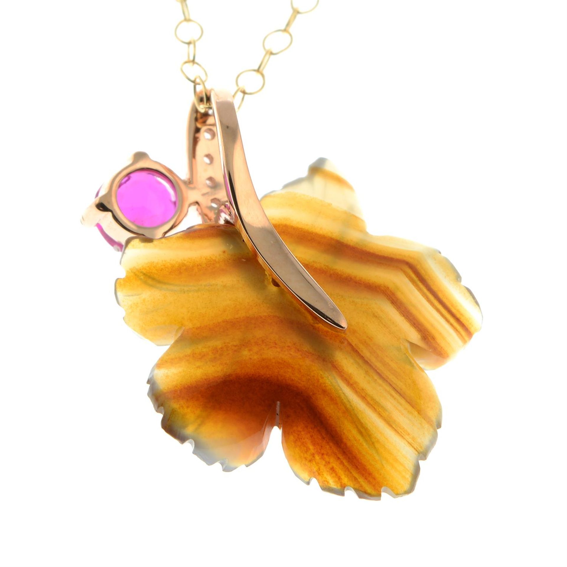 A carved foliate agate pendant, with diamond stem and ruby bud, with chain. - Image 3 of 5