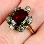 A late Georgian foil back garnet and vari-cut diamond cluster, on later 19th century 15ct gold ring