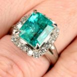 A Colombian emerald and brilliant-cut diamond cluster ring.