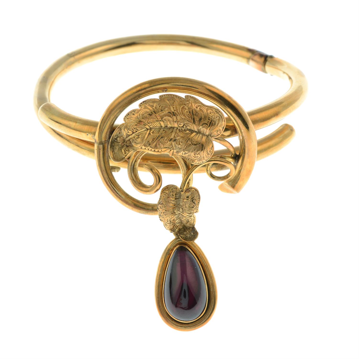 A mid to late Victorian 14ct gold foliate hinged bangle, with garnet locket drop. - Image 2 of 3
