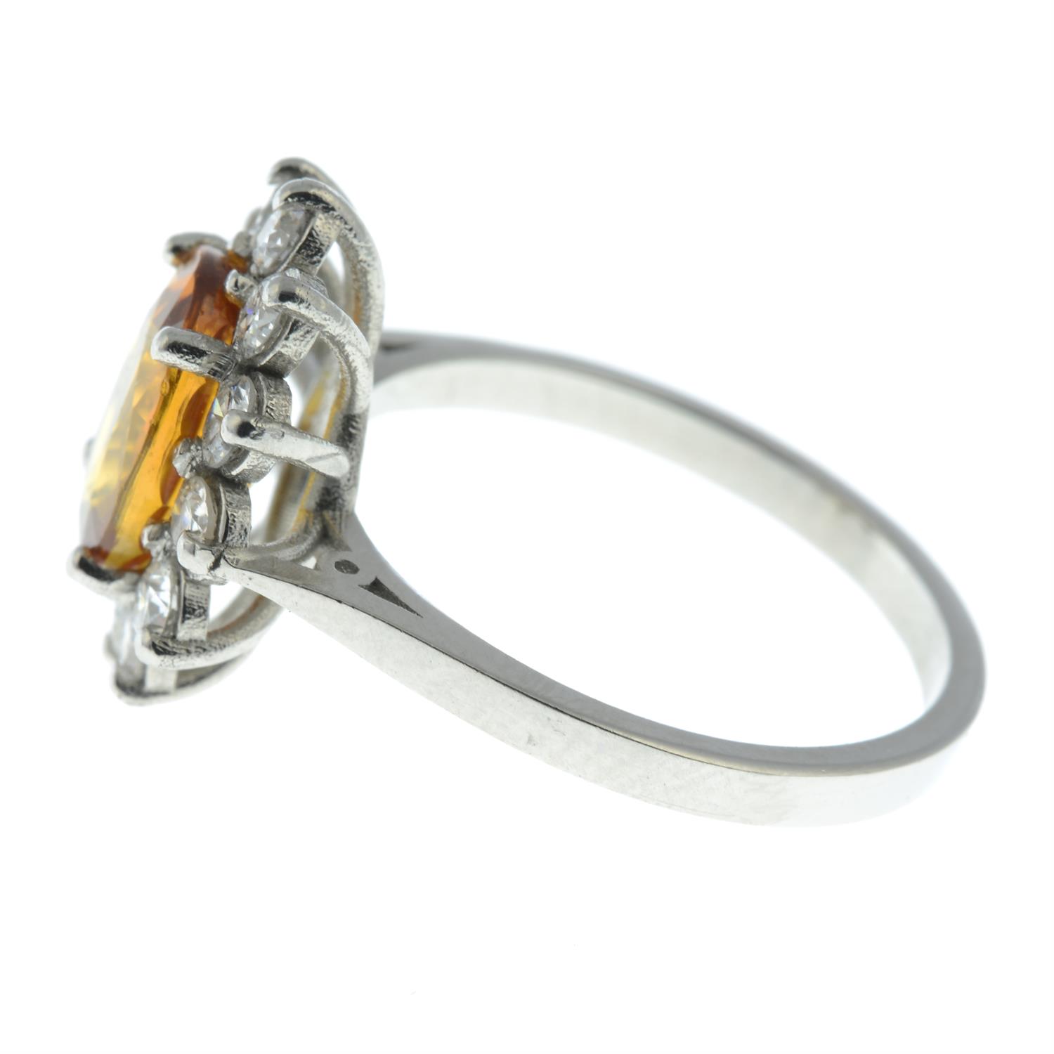 An orange sapphire and brilliant-cut diamond cluster ring. - Image 3 of 5