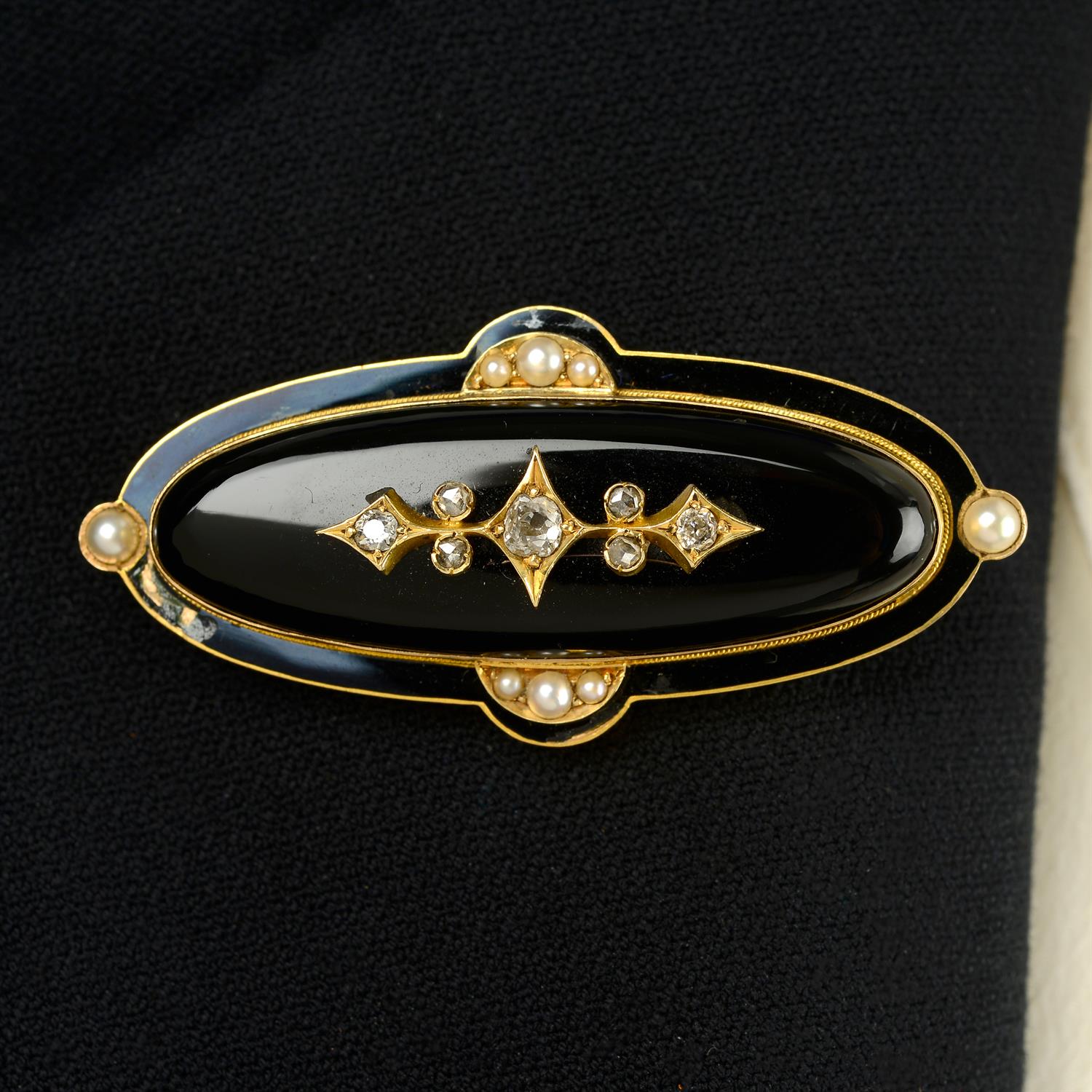 A late 19th century gold onyx and vari-cut diamond mourning brooch, with black enamel and split