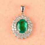 An emerald and brilliant-cut diamond cluster pendant.