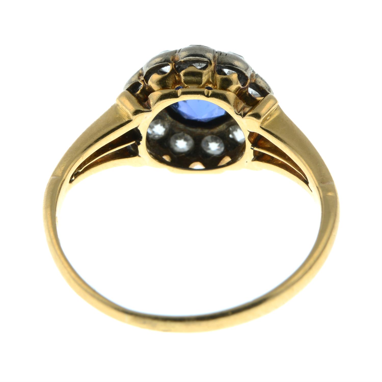 An early 20th century gold sapphire and old-cut diamond cluster ring, with openwork shoulders. - Image 4 of 5