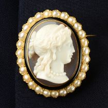 A late 19th century 18ct gold carved sardonyx cameo brooch, with black enamel and split pearl