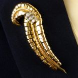 A 1940s gold single-cut diamond feather brooch.