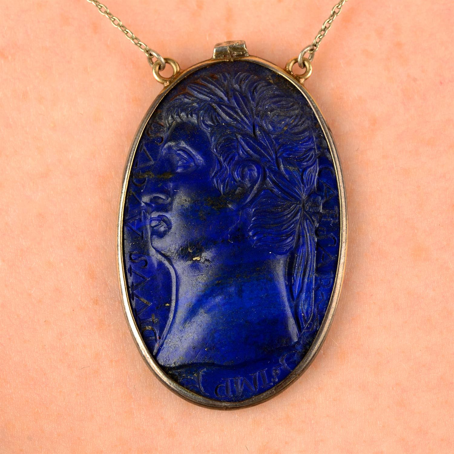 An early 20th century carved lapis lazuli cameo pendant, depicting Augustus Caesar,