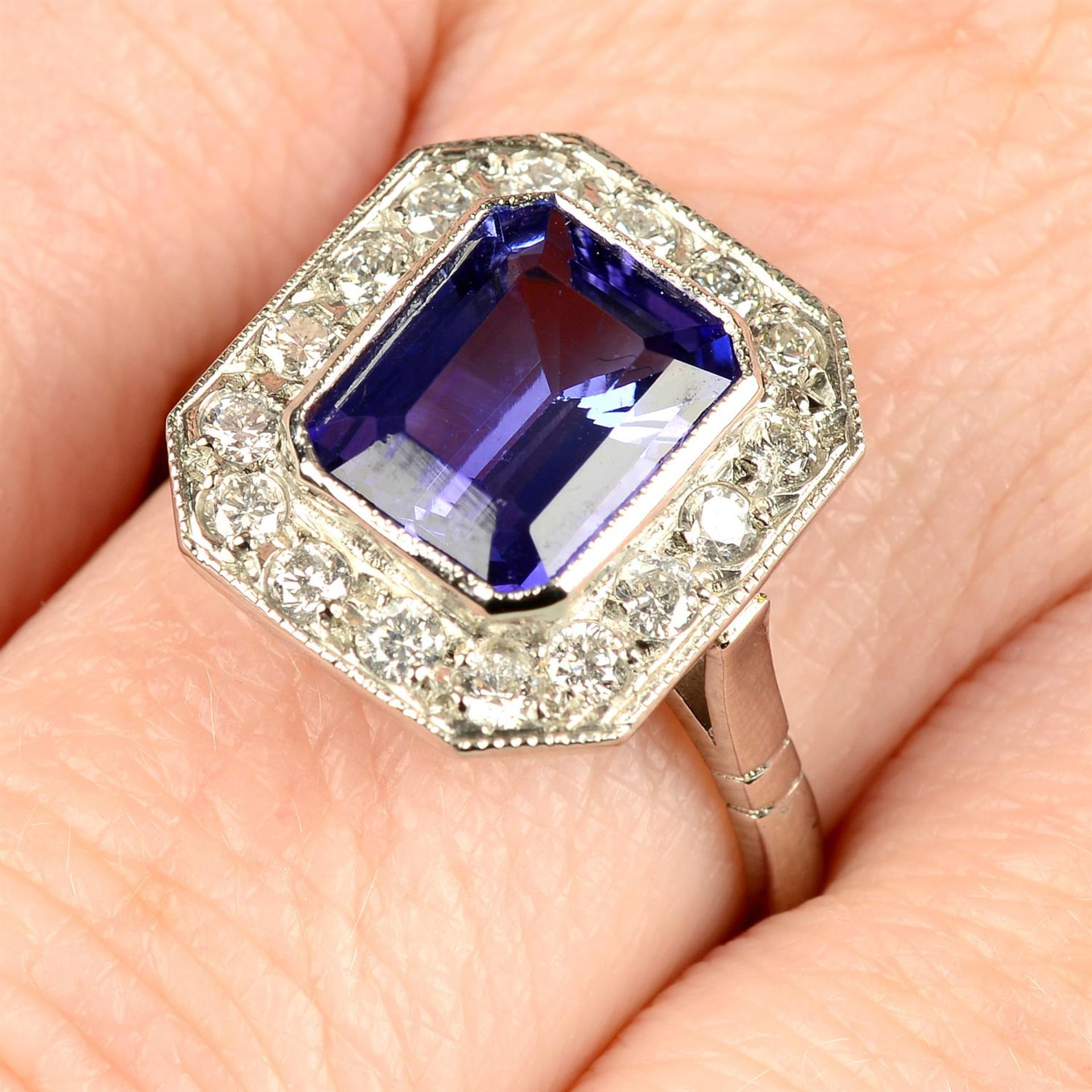 A tanzanite and brilliant-cut diamond cluster ring.