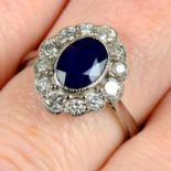 A sapphire and brilliant-cut diamond cluster ring.