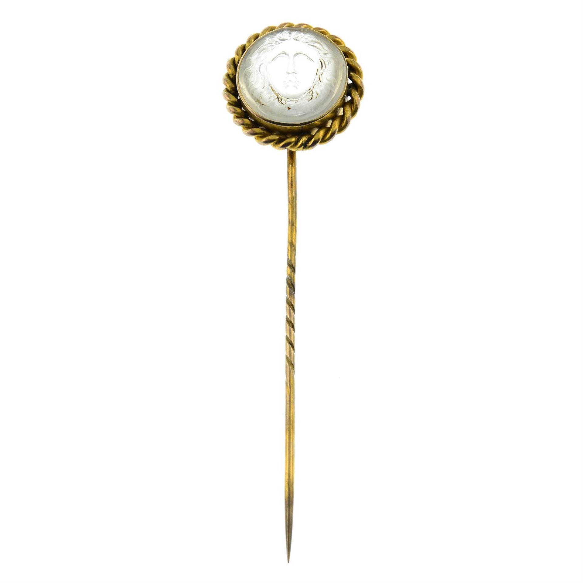 A late Victorian gold rock crystal cameo stickpin, carved to depict the head of Medusa. - Image 2 of 4