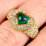 A heart-shape emerald cabochon and pavé-set diamond dress ring.