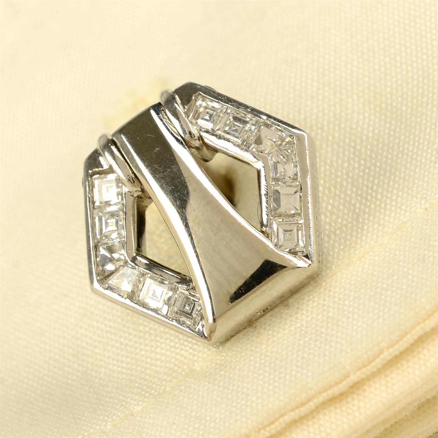 A pair of vari-cut diamond hexagonal-shape cufflinks.