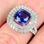 A tanzanite and brilliant-cut diamond cluster ring.