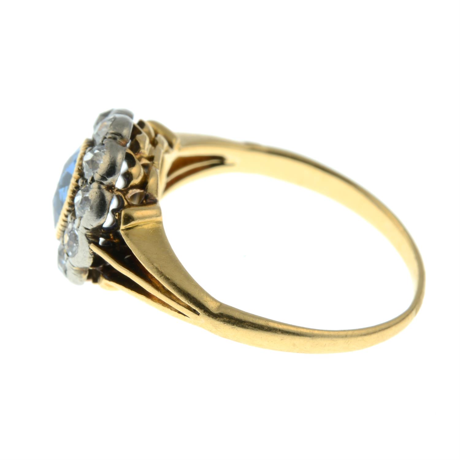 An early 20th century gold sapphire and old-cut diamond cluster ring, with openwork shoulders. - Image 3 of 5