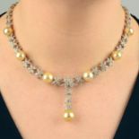 A necklace, designed as a series of graduated brilliant-cut diamond flowers, with cultured pearl