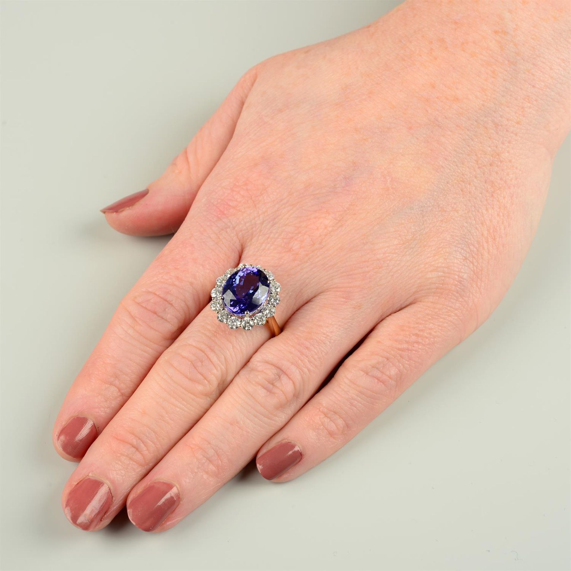 An 18ct gold tanzanite and brilliant-cut diamond cluster ring. - Image 5 of 5