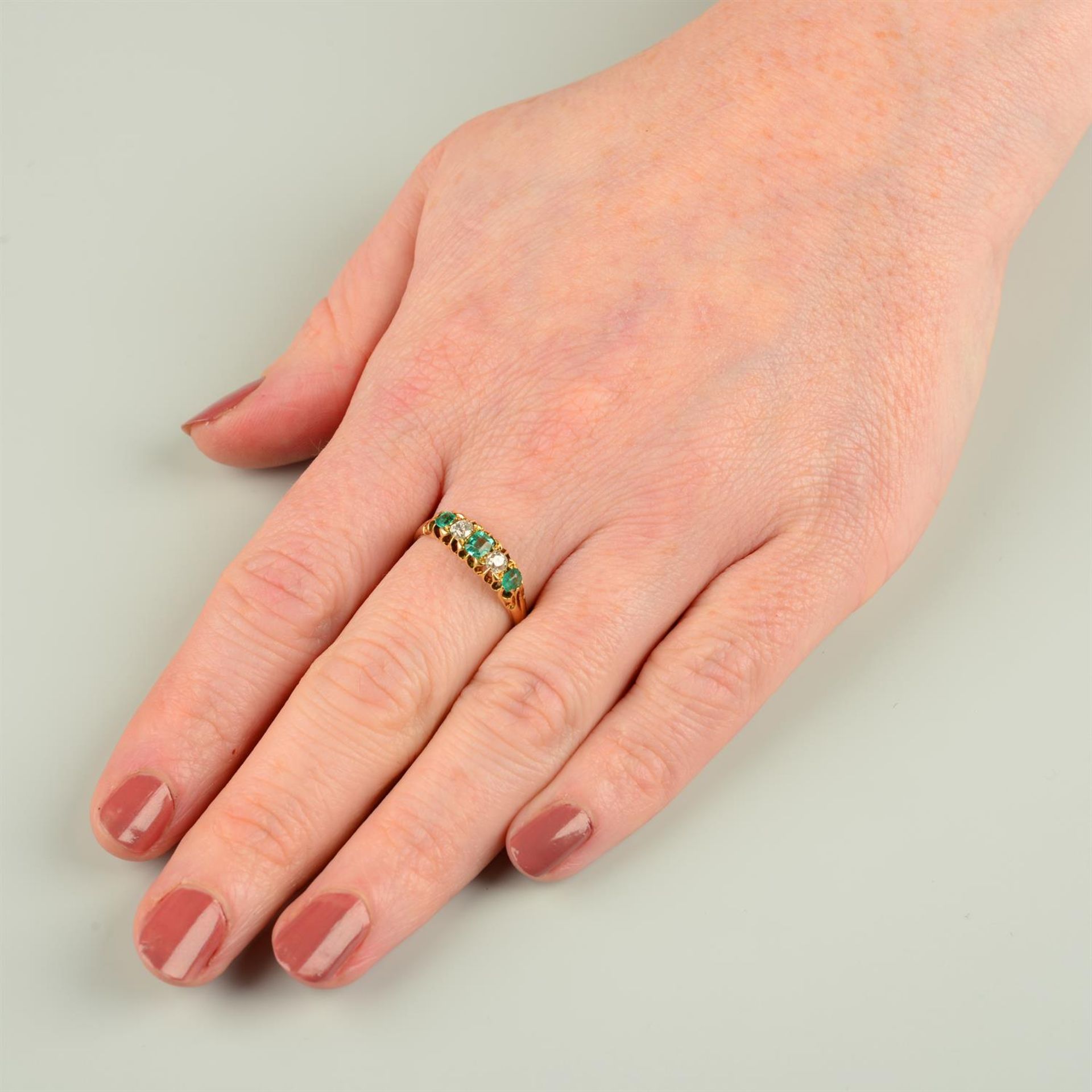 An 18ct gold emerald and old-cut diamond five-stone ring, with partial band replacement. - Bild 4 aus 4