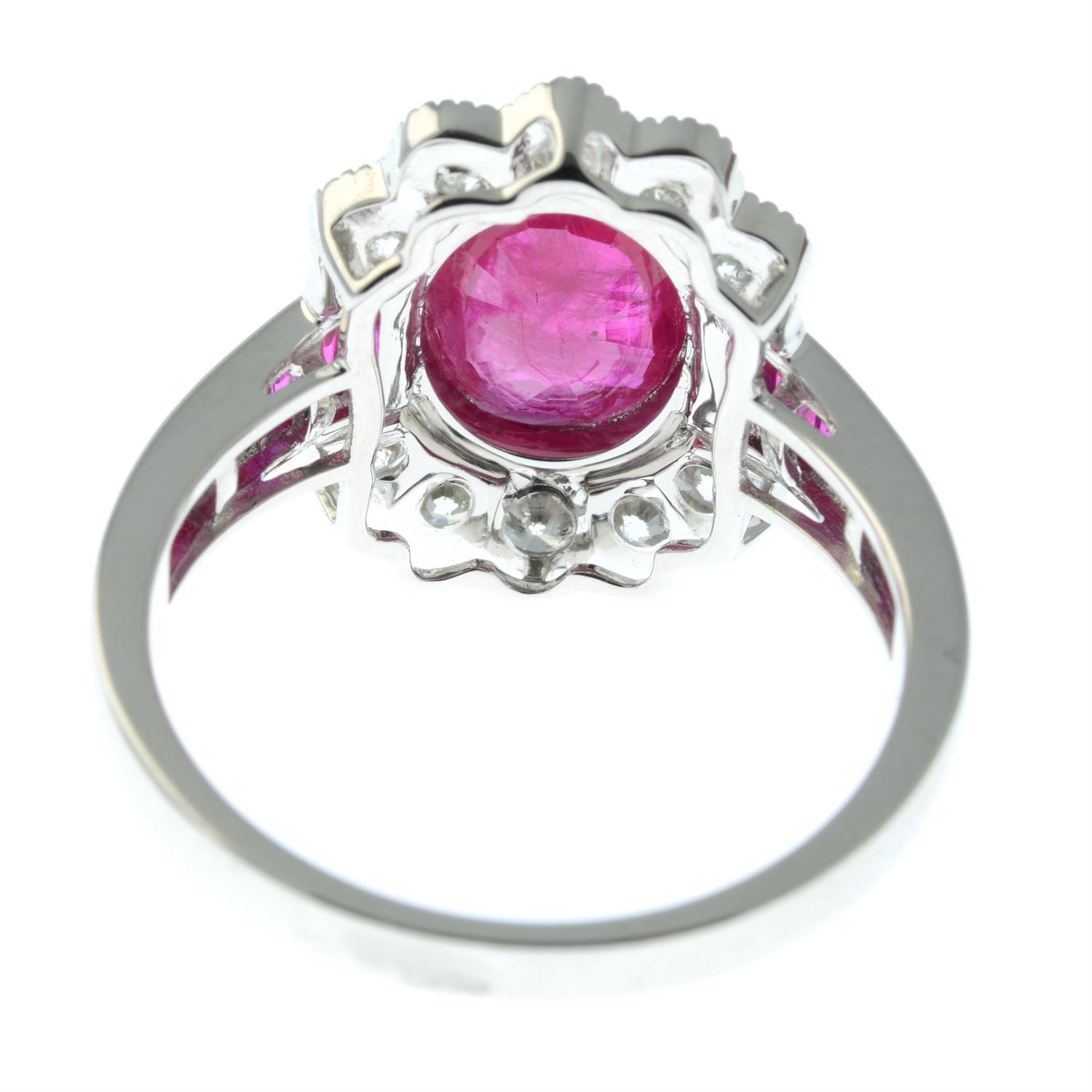 An 18ct gold oval-shape ruby and brilliant-cut diamond cluster ring, with calibre-cut ruby line - Image 4 of 5