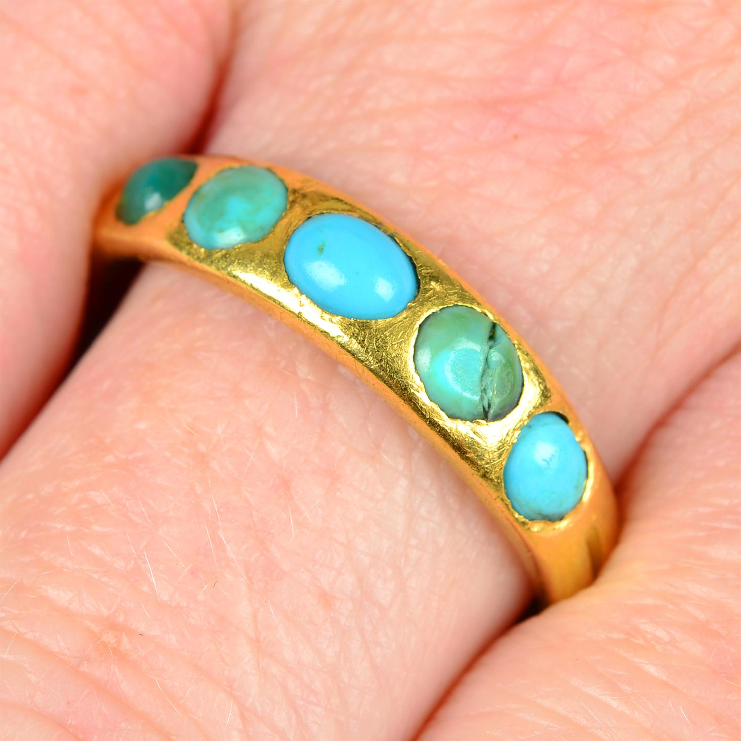 A 19th century 18ct gold turquoise five-stone band ring.